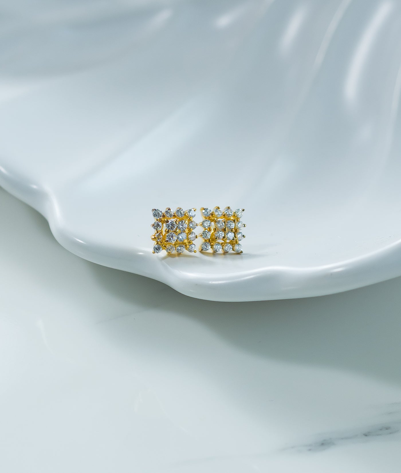 mirage stud earrings